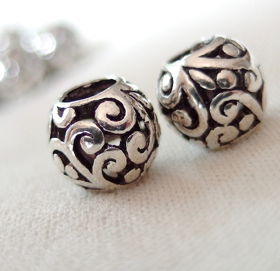 10pc Silver scroll pattern, Black Antiqued large hole beads, 10 x 9mm, hole 4.5mm, pkg of 10. FREE SHIPPING on 75 dollar order, code FREE75