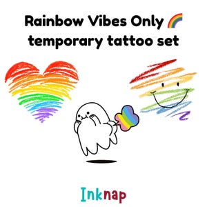 May include: A temporary tattoo set with the text "Rainbow Vibes Only". The set includes a rainbow heart, a smiling face with rainbow strokes, and a cartoon character emitting a rainbow cloud. The brand name "Inknap" is at the bottom.