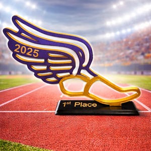 May include: A track and field award trophy featuring a winged foot design in gold, purple, and white. The trophy is on a black base with "1st Place" in gold lettering. The year "2025" is displayed on the wing.