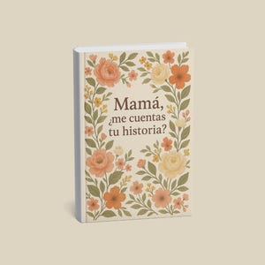 Puede incluir: Un libro de tapa dura con un diseño floral. La portada presenta un fondo crema con una corona de flores melocotón, naranja y amarillas y hojas verdes. El texto "Mamá, ¿me cuentas tu historia?" está impreso en marrón.