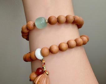 Pulsera de meditación de sándalo aromático: Mala hecha a mano para zen, relajación y espiritualidad.