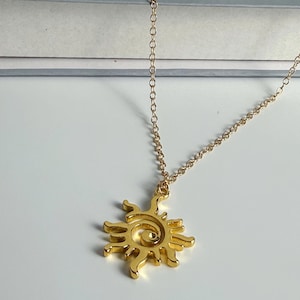 Sun Spiral Pendant Necklace: Gold Electroplated Alloy Unisex Jewelry