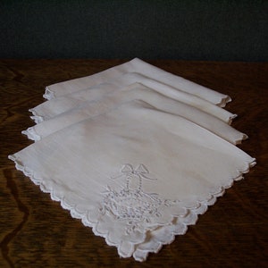 Four Vintage Embroidered Linen Napkins with Basket Motif and Scalloped Edges