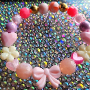 Pink bow with love bracelet