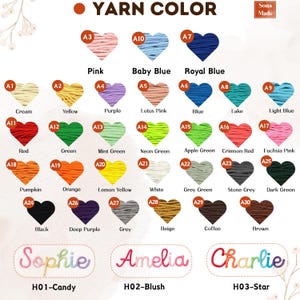 May include: A color chart displaying yarn colors, including pink, baby blue, and royal blue. The chart also features names like "Sophie," "Amelia," and "Charlie" in yarn. The text "Yarn Color" is at the top.