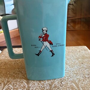 Vintage Wade Potteries Johnny Walker Logo Water Pitcher. Mint condition! Beautiful Blue with Striding Johnny Walker Logo. 1950s era.