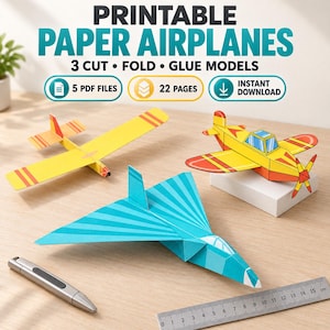May include: A set of printable paper airplanes featuring 3 cut, fold, and glue models across 22 pages in 5 PDF files. The image displays a yellow glider, a yellow and red propeller plane, and a blue jet, alongside a pen and a 15 cm ruler.
