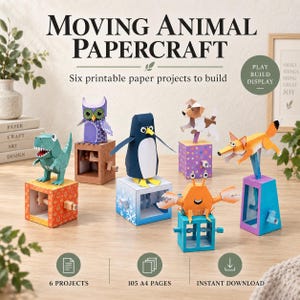 May include: Six moving animal papercraft projects including a green dinosaur, purple owl, blue penguin, brown and white dog, orange fox, and orange crab. Each figure sits on a colourful base with a hand crank. Text reads Moving Animal Papercraft.
