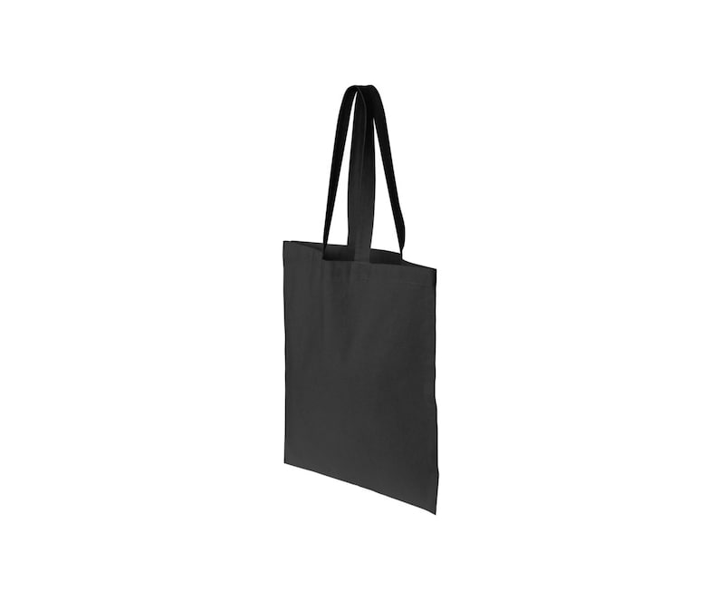 May include: A black tote bag with two long handles. The bag is made of a canvas material.