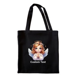 May include: Black tote bag with a white angel illustration and the text "Custom Text".