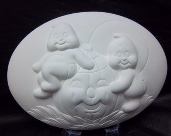 Ghost insert ( D-1439) ceramic bisque ready to be painted.