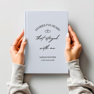 A5 hardcover lined journal shown by a model in the color "sky."