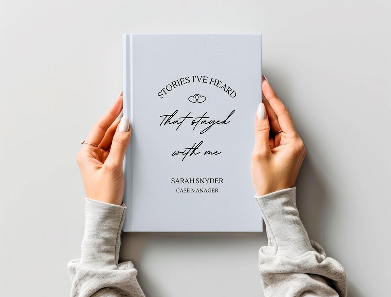 A5 hardcover lined journal shown by a model in the color "sky."
