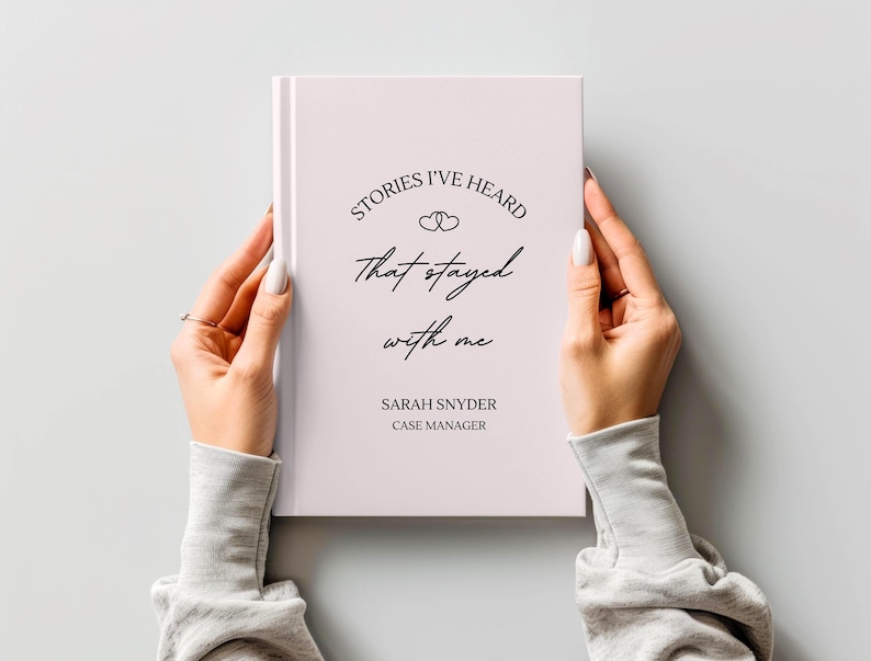 A5 hardcover lined journal shown by a model in the color "blush."