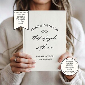 A5 hardcover lined journal shown by a model in the color "cream."
