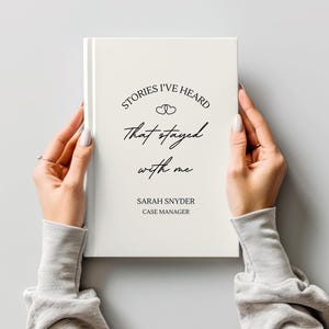 A5 hardcover lined journal shown by a model in the color "cream."