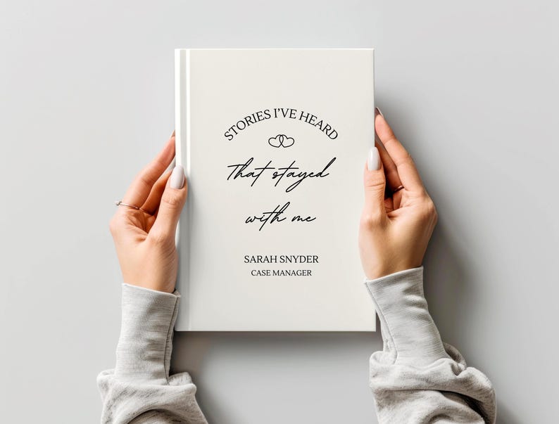 A5 hardcover lined journal shown by a model in the color "cream."