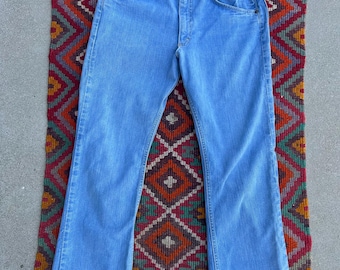 70’s light wash Lee bell bottoms waist 32