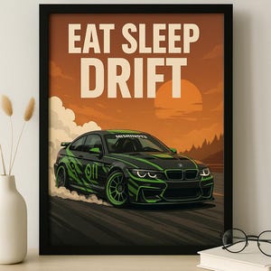 May include: Black framed poster featuring a black and green sports car drifting, with the words "EAT SLEEP DRIFT". The background is an orange sunset. The car has green accents and the text "MISHINOTS".