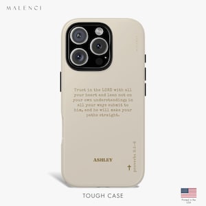 May include: A cream-coloured phone case featuring a religious quote, the name "ASHLEY", and a cross. The case has a camera cutout and black side buttons. The text reads "Trust in the LORD with all your heart..." and is labelled "proverbs 3:5-6".