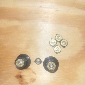 Shell casing controller buttons