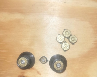 Shell casing controller buttons
