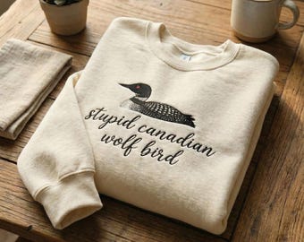 Sudadera bordada "Heavy Rivalry", merchandising de Hollanov Rozanov, diseño de pájaro lobo canadiense, regalo LGBT de hockey romántico