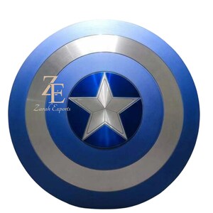 May include: A blue and silver shield with a central silver star design. The shield has concentric circles of blue and silver, with the text "Zarah Exports" visible. A classic superhero accessory.