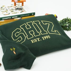 Shiz Hoodie Embroidered Wickeds Movie, Wizard Shiz University Sweatshirt, Defying Gravitiy Shirt, Best Wickeds Merch Movie Lover Gift