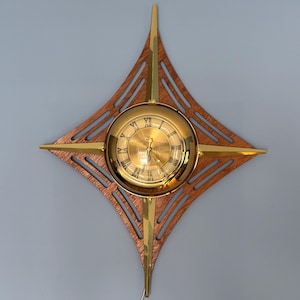 Horloge Starburst United Clock modèle 86 vintage années 1950, Mid Century Modern, horloge murale Atomic bois laiton