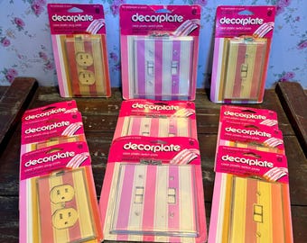 Vintage 1970s-80s Decorplate wall plate, transparent, covers a switch or socket, new in packaging, sold individually