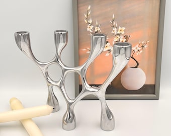 Candelabro Umbra Vela de Constantin Wortmann, metal plateado reversible, diseño contemporáneo, lámpara de araña escultural moderna