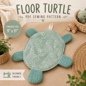 May include: A flat, turtle-shaped fabric item with a green floral patterned shell and textured green limbs. The text reads FLOOR TURTLE PDF SEWING PATTERN and BEGINNER FRIENDLY. A circular graphic indicates a finished size of 9 inches by 11 inches.