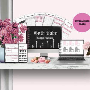 May include: A digital budget planner with a black cover that reads "Guth Babe Budget Planner" with candle illustrations. The image also shows a tablet and laptop displaying budget planning pages, along with pink flowers and candles.