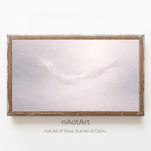 May include: A framed art print featuring a flowing white fabric against a soft, pastel background. The artwork is enclosed in a rustic, wooden frame. The text "nAotArt - not All of Tone, but All of Calm" is visible.