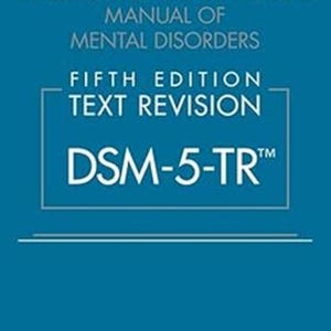 May include: A blue book cover with white text. The title reads "Diagnostic and Statistical Manual of Mental Disorders, Fifth Edition, Text Revision." The book is labeled "DSM-5-TR" and published by the American Psychiatric Association.