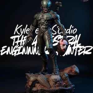 Puede incluir: Estatua impresa en 3D de una figura humanoide alienígena sosteniendo una cabeza cortada. La figura es de color verde oscuro y gris, de pie sobre una base rocosa. El texto "Kyle Verse Studio" y "The A.I. Engineer Hunter" es visible.