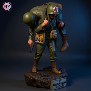 May include: A detailed statue depicting a soldier carrying another soldier on his back. The statue features olive green uniforms, helmets, and medical bags. One soldier holds a gun. The base of the statue has the text "HACKSAW RIDGE".