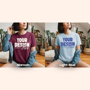 May include: Maroon and light blue t-shirts with the text "YOUR DESIGN Here" in a bold font. The shirts are short-sleeved and are being modeled. The word "Maroon" and "Light Blue" are displayed below the shirts.