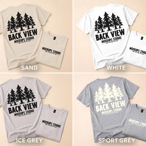 May include: Four t-shirts in sand, white, ice grey, and sport grey. Each shirt has a black graphic of pine trees and the text "BACK VIEW MOCKUPS STUDIO". The shirts are folded and displayed.