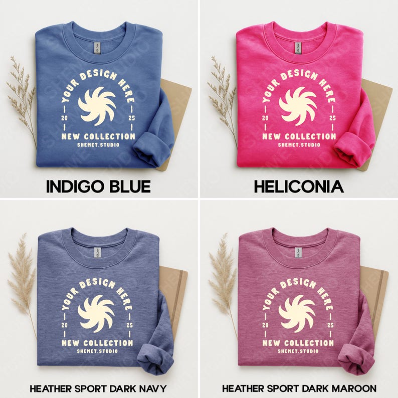 Puede incluir: Cuatro sudaderas de cuello redondo en azul &iacute;ndigo, heliconia, azul marino oscuro deportivo jaspeado y granate oscuro deportivo jaspeado. Cada sudadera presenta un gr&aacute;fico blanco con el texto "YOUR DESIGN HERE", "NEW COLLECTION" y "SHEMET.STUDIO".