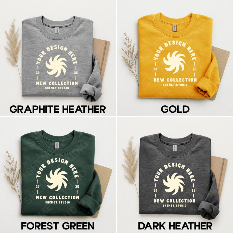 Puede incluir: Cuatro sudaderas de cuello redondo en gris grafito, dorado, verde bosque y gris oscuro. Cada sudadera presenta un dise&ntilde;o circular con el texto "YOUR DESIGN HERE" y "NEW COLLECTION SHEMET.STUDIO". Las sudaderas se muestran sobre un fondo neutro.