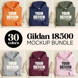 Peut inclure: Un ensemble de maquettes de sweats à capuche Gildan 18500 de différentes couleurs, dont orange, bleu marine et vert olive. Chaque sweat affiche le texte "YOUR DESIGN Here". Le lot propose 30 couleurs au total.