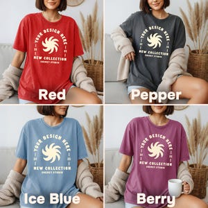 May include: Four different colored t-shirts: red, pepper, ice blue, and berry. Each shirt has a circular design with the text "YOUR DESIGN HERE" and "NEW COLLECTION SHEMET.STUDIO". The shirts are displayed on a person.