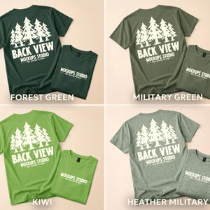 May include: Four t-shirts in various shades of green: forest, military, kiwi, and heather military. Each shirt features a white graphic of pine trees and the text "BACK VIEW MOCKUPS STUDIO". The shirts are displayed with a folded shirt of the same color.