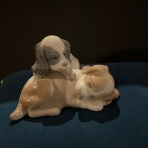 NAO Lladro porcelain figurine of puppies