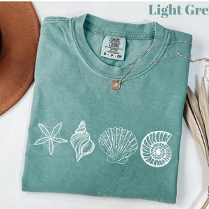 Camiseta de conchas marinas de los 90 con estilo vintage de Comfort Colors®, camiseta retro Y2K con conchas marinas, camiseta para amantes del mar, camisetas de verano con océano, camiseta con animales marinos adorables