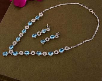 Blue Topaz Sterling Silver Necklace Earring Set: Oval Cut Gemstone