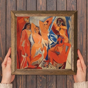 Może przedstawiać: Oprawiony abstrakcyjny obraz w drewnianej ramie. Dzieło przedstawia postacie w odcieniach pomarańczu, czerwieni i niebieskiego. Obraz ma styl kubistyczny, z geometrycznymi kształtami i odważnymi liniami. Ogólnym tematem jest sztuka figuratywna.