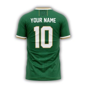 May include: Green soccer jersey with the number 10 and the text "YOUR NAME" in white. The jersey has gold and white accents on the collar and sleeves. The back of the jersey features a geometric design.